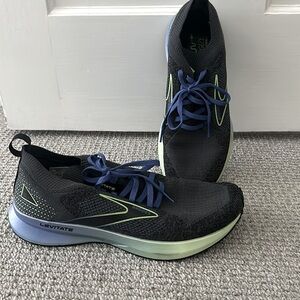 Brooks running shoes. Barely worn.Dark gray w/ blue and yellow low accent colors